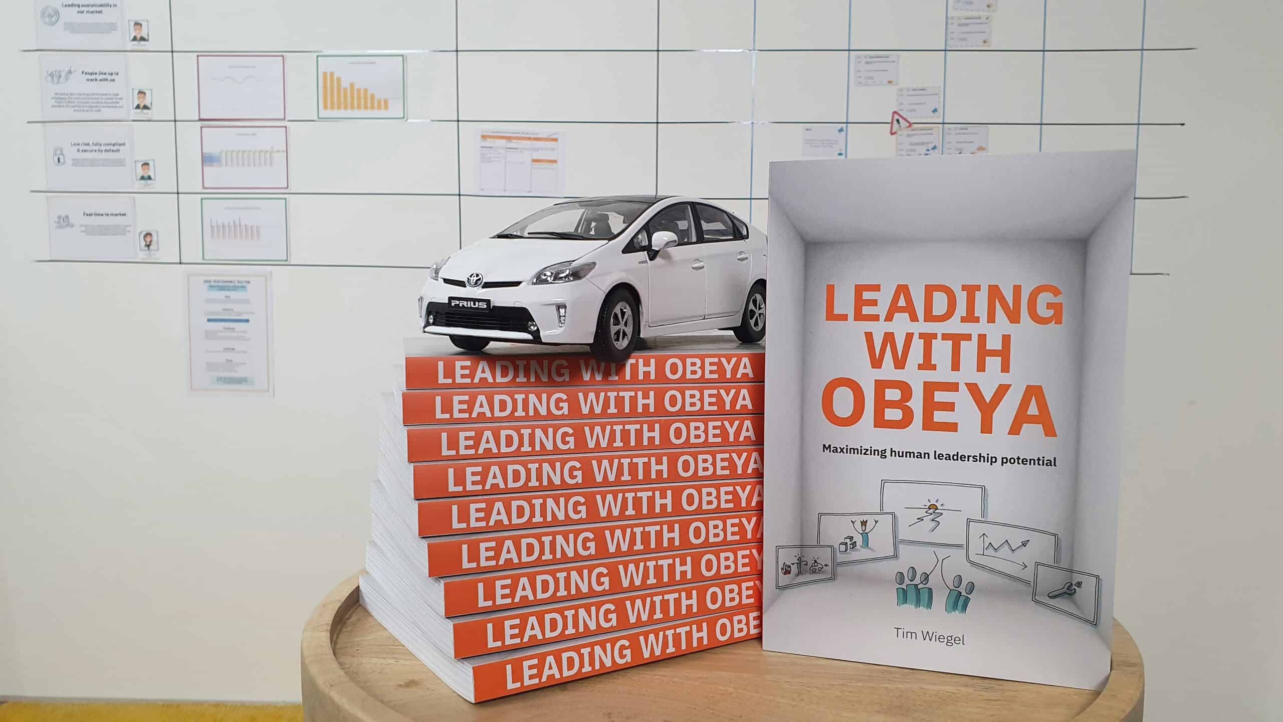stack of leading with Obeya books
